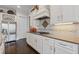 Modern kitchen with white cabinetry, stainless steel appliances, and a tiled backsplash at 340 Marietta Walk Ln, Marietta, GA 30064