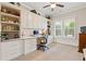 Bright home office with custom built-ins, desk space, and plenty of storage at 340 Marietta Walk Ln, Marietta, GA 30064