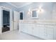 Beautiful bathroom with white cabinets, marble countertops, and decorative tile floors at 468 W Paces Ferry Rd, Atlanta, GA 30305