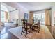 Elegant dining room showcasing a large table with seating for eight, ideal for formal dinners at 468 W Paces Ferry Rd, Atlanta, GA 30305