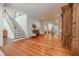 Spacious foyer with staircase, hardwood floors and detailed woodwork at 468 W Paces Ferry Rd, Atlanta, GA 30305