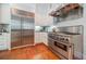 Well-equipped kitchen featuring stainless steel appliances and subway tile backsplash at 468 W Paces Ferry Rd, Atlanta, GA 30305
