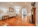 Inviting living room with hardwood floors, panelled walls, fireplace, and ample natural light at 468 W Paces Ferry Rd, Atlanta, GA 30305