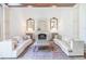 Chic living room with a fireplace and plush seating, offering a cozy and elegant space at 468 W Paces Ferry Rd, Atlanta, GA 30305