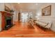 Elegant living room with fireplace, decorative molding and gleaming hardwood floors at 468 W Paces Ferry Rd, Atlanta, GA 30305