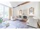 Spacious living room featuring a fireplace, large windows, and neutral-toned furniture creating a relaxing atmosphere at 468 W Paces Ferry Rd, Atlanta, GA 30305