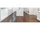 A bright walk-in closet with custom-built cabinetry and spacious storage options at 468 W Paces Ferry Rd, Atlanta, GA 30305