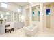 Elegant bathroom with dual vanities, soaking tub, and separate shower featuring custom cabinetry at 0 Ebenezer Rd, Fayetteville, GA 30215
