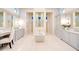 Spacious bathroom with dual vanities, a soaking tub, a separate shower, and custom cabinetry at 0 Ebenezer Rd, Fayetteville, GA 30215