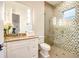 Stylish bathroom with a glass shower, decorative tile accent, and a vanity with ample counter space at 0 Ebenezer Rd, Fayetteville, GA 30215