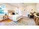 Bright bedroom featuring natural light, artwork, hardwood floors and area rug at 0 Ebenezer Rd, Fayetteville, GA 30215