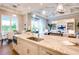 Open concept kitchen with stone countertops and stainless appliances flows to living area at 0 Ebenezer Rd, Fayetteville, GA 30215