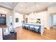 Open-concept kitchen with a large island, white cabinetry, and stainless steel appliances at 0 Ebenezer Rd, Fayetteville, GA 30215