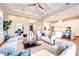 Open-concept living room with high ceilings, modern furnishings, and a seamless flow to the kitchen at 0 Ebenezer Rd, Fayetteville, GA 30215