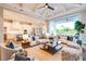 Spacious living area with an open floor plan, comfortable sofas, and a large sliding glass door to the patio at 0 Ebenezer Rd, Fayetteville, GA 30215