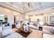 Open-concept living room with hardwood floors, designer furnishings, and an adjacent modern kitchen at 0 Ebenezer Rd, Fayetteville, GA 30215