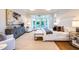Bright main bedroom with white accents, rug, and chairs, plus access to the outdoors at 0 Ebenezer Rd, Fayetteville, GA 30215