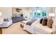 Bright main bedroom with white accents, rug, and chairs, plus access to the outdoors at 0 Ebenezer Rd, Fayetteville, GA 30215