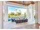 Stylish outdoor patio with a seating area, a pool, and manicured landscaping in the background at 0 Ebenezer Rd, Fayetteville, GA 30215