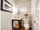 Elegant powder room with striking accent wall, vessel sink, and modern fixtures at 0 Ebenezer Rd, Fayetteville, GA 30215