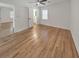 Minimalist bedroom featuring hardwood floors, a ceiling fan, and ample natural light at 2740 Flagstone Se Dr, Atlanta, GA 30316