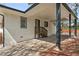 Featuring a covered parking area with a small deck and stairwell access to the back door at 2740 Flagstone Se Dr, Atlanta, GA 30316