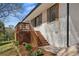 A beautiful home featuring exterior brickwork, shutters, and lush landscaping at 2740 Flagstone Se Dr, Atlanta, GA 30316