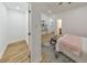 Main bedroom with ensuite access, decor and hardwood floors at 2740 Flagstone Se Dr, Atlanta, GA 30316
