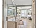 Bathroom featuring tiled floors, a tub, a shower, double vanities and white cabinetry at 5848 Deer Crossing Dr, Sugar Hill, GA 30518
