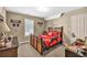 Bedroom with sporty theme including a bed with baseball bat accents and sports decor at 5848 Deer Crossing Dr, Sugar Hill, GA 30518