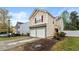 Inviting home with a two-car garage, tidy landscaping, and a well-maintained driveway at 112 Silver Fox Trl, Dallas, GA 30157