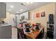 Eat-in kitchen featuring stainless appliances and grey cabinets at 112 Silver Fox Trl, Dallas, GA 30157