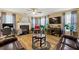Spacious living room with hardwood floors, a fireplace, and a comfortable leather sectional at 112 Silver Fox Trl, Dallas, GA 30157