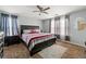 Spacious main bedroom with a large bed, two windows and neutral carpet at 112 Silver Fox Trl, Dallas, GA 30157