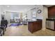 Open-concept living space with tile flooring, and stainless steel appliances at 2285 Peachtree Ne Rd # 1207, Atlanta, GA 30309