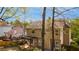 Two-story home with a spacious backyard and deck at 3270 River Summit Trl, Duluth, GA 30097