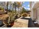 Spacious backyard with an elevated deck and mature trees at 3270 River Summit Trl, Duluth, GA 30097