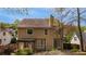 Two-story home with a spacious backyard, deck, and pergola at 3270 River Summit Trl, Duluth, GA 30097
