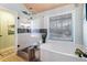 Beautiful bathroom featuring a standalone shower, soaking tub, and large window at 3270 River Summit Trl, Duluth, GA 30097