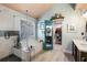Stylish bathroom with subway tile, a soaking tub, and a walk-in closet at 3270 River Summit Trl, Duluth, GA 30097