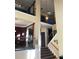Open two-story foyer showcasing hardwood floors and elegant architectural details at 3270 River Summit Trl, Duluth, GA 30097