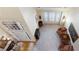 Grand foyer featuring soaring ceilings, hardwood floors, and an abundance of natural light at 3270 River Summit Trl, Duluth, GA 30097