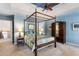 Spacious main bedroom featuring ample closet space, a ceiling fan, and neutral carpeting at 3270 River Summit Trl, Duluth, GA 30097