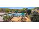 Community playground and tennis courts area with benches and green landscaping at 3270 River Summit Trl, Duluth, GA 30097