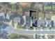 Aerial view of a neatly planned neighborhood highlighting the property's location and lot size at 211 Orchard Trl, Canton, GA 30115