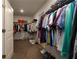Spacious walk-in closet with plenty of storage space and racks for clothes and shoes at 211 Orchard Trl, Canton, GA 30115