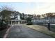View of the clubhouse near a lake with community condos at 35 Rumson Se Ct, Smyrna, GA 30080