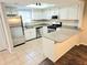 Bright kitchen with stainless steel appliances and updated countertops at 35 Rumson Se Ct, Smyrna, GA 30080