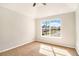 Neutral bedroom with large window offering bright natural light at 498 Pecan Wood Cir, Fairburn, GA 30213