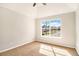 Cozy bedroom with natural light streaming through a large window and light walls at 498 Pecan Wood Cir, Fairburn, GA 30213